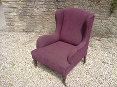 Antique low wing chair by Howard and Sons3.jpg